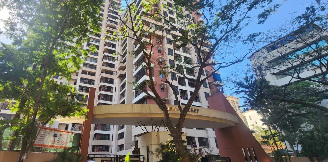Restored residential high-rise building in Mumbai maintained by Care Takers Exterior & Interior Pvt. Ltd.